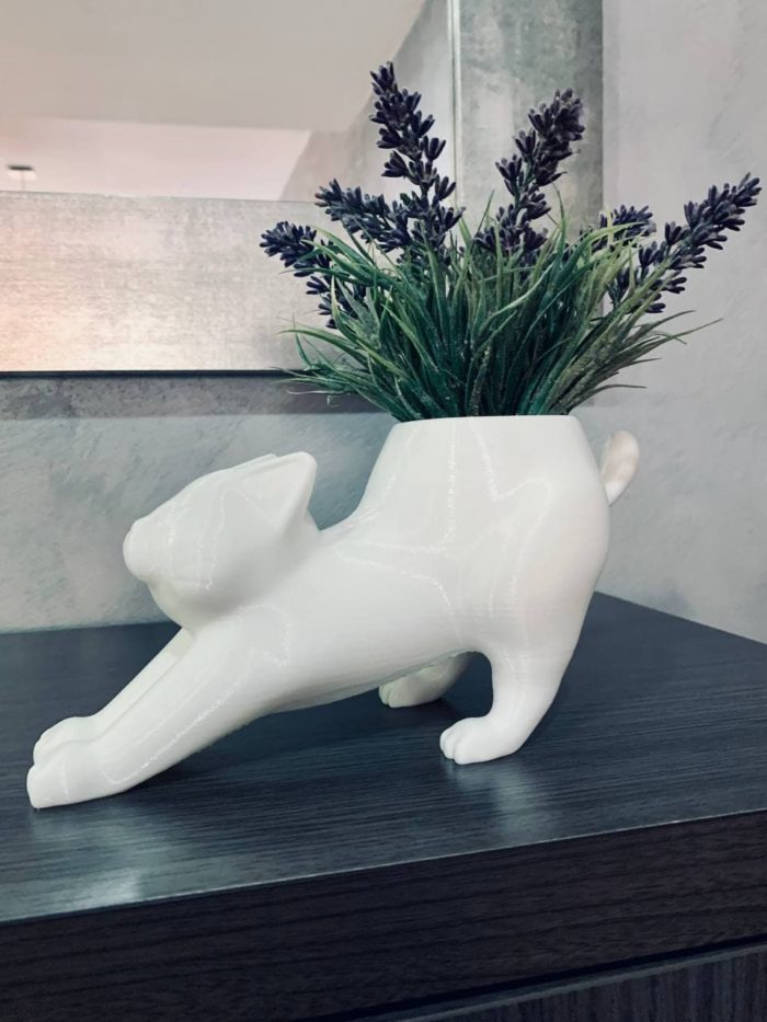 White cat planter pot with plant